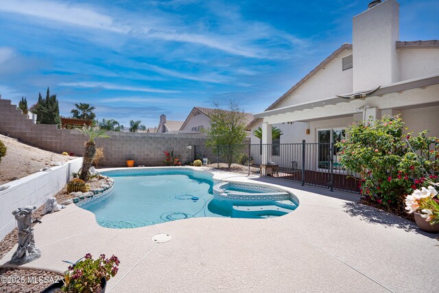 10187 E Watson Dr, Tucson, AZ 85730 - view of swimming pool with a fenced backyard, a pool with connected hot tub, and a patio