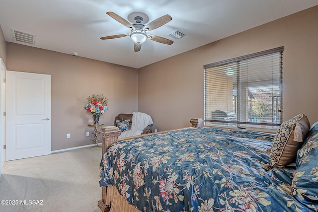 bedroom with ceiling fan and carpet floors