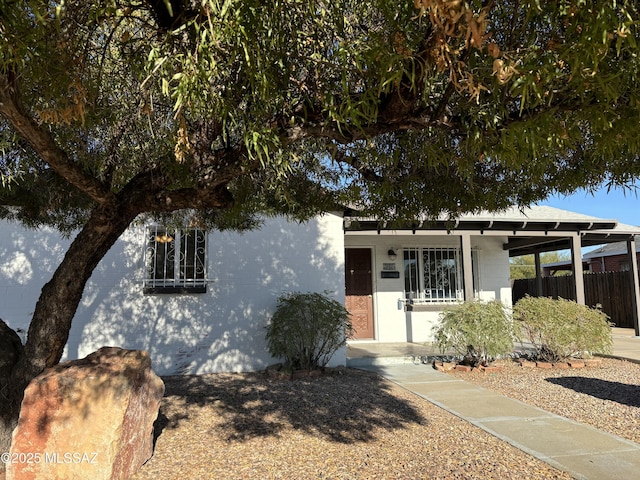 view of front of house featuring a carport