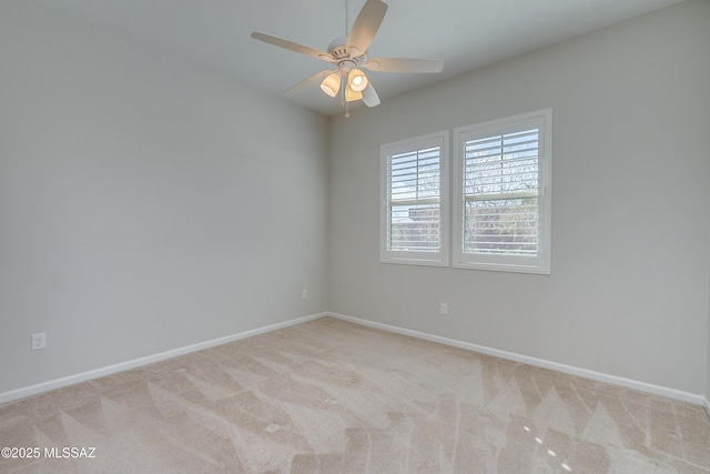 empty room with light carpet and ceiling fan