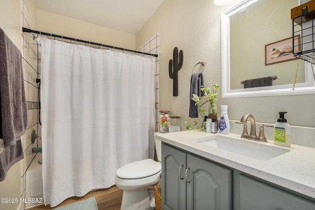 full bathroom featuring toilet, vanity, shower / bath combo, and hardwood / wood-style floors