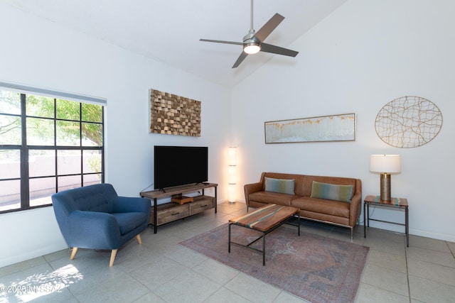 living room with ceiling fan, high vaulted ceiling, and light tile patterned flooring