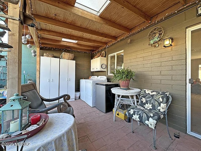 view of patio featuring independent washer and dryer