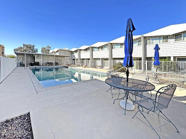 view of swimming pool featuring a patio