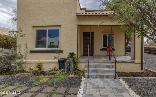 property entrance with a porch