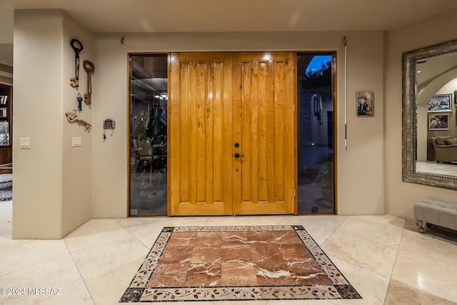 entrance to property with covered porch