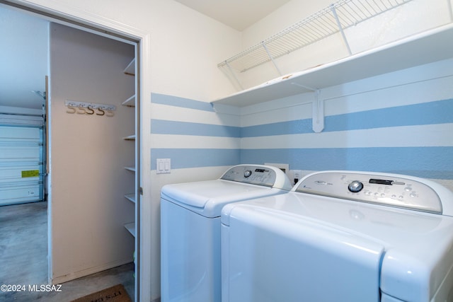 laundry room with washer and clothes dryer