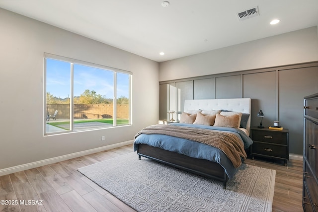 bedroom with light wood-type flooring