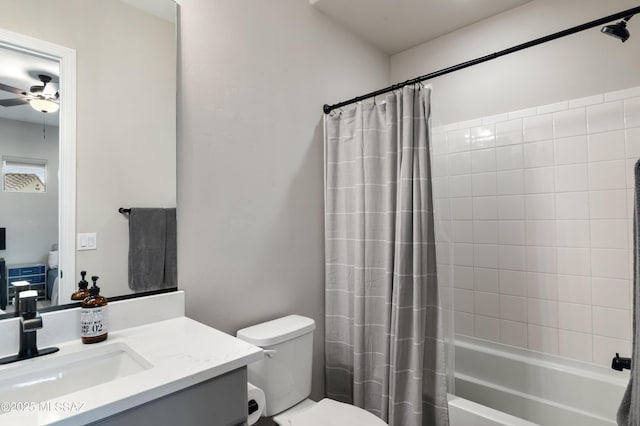 full bathroom with toilet, vanity, shower / bathtub combination with curtain, and ceiling fan