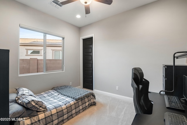 carpeted bedroom with ceiling fan