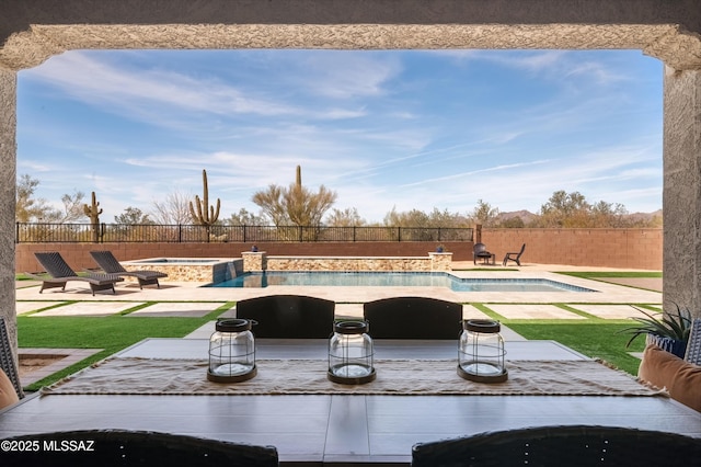 view of swimming pool featuring a patio