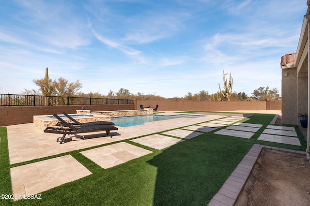 view of swimming pool with an in ground hot tub and a patio area