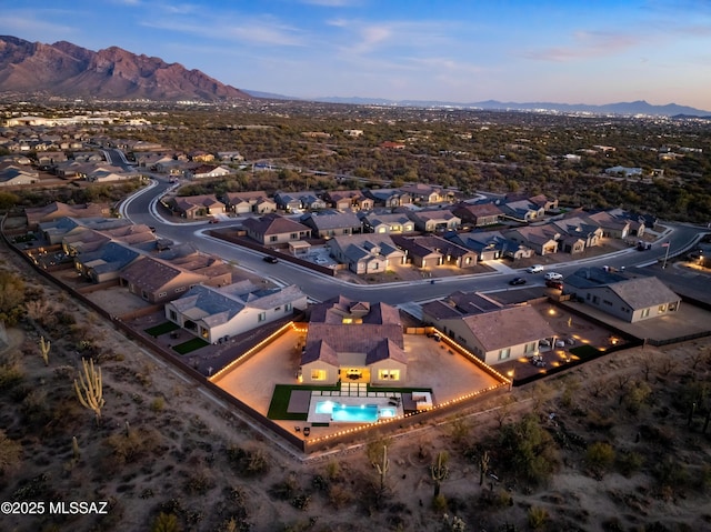 bird's eye view with a residential view and a mountain view