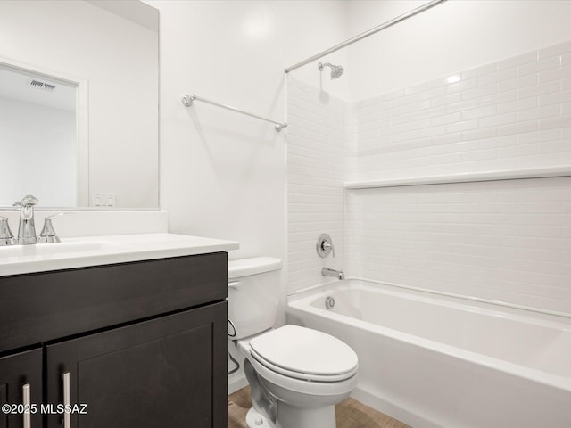 bathroom with toilet, shower / bathing tub combination, vanity, and visible vents