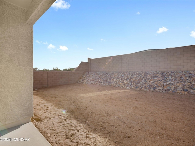 view of yard featuring a fenced backyard