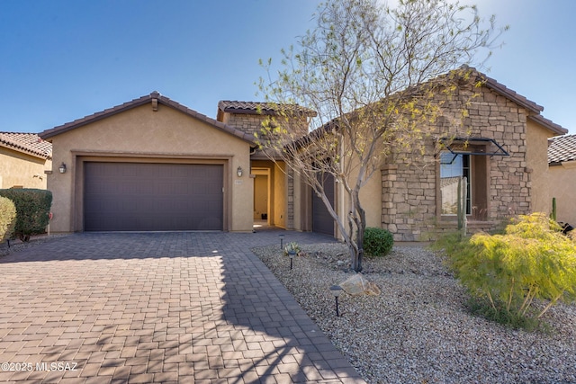 view of front of home with a garage