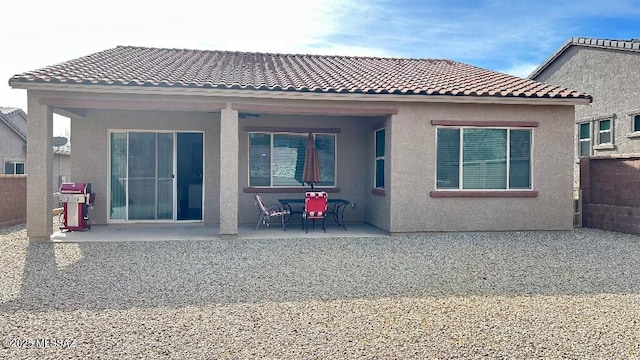 rear view of house with a patio