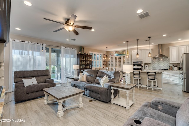 living room featuring ceiling fan