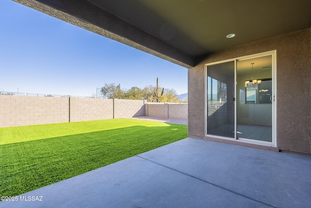 view of patio with a fenced backyard