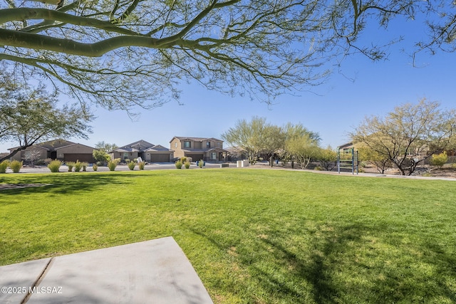 surrounding community featuring a lawn