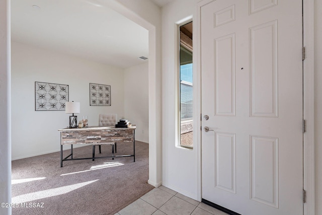 view of carpeted entryway