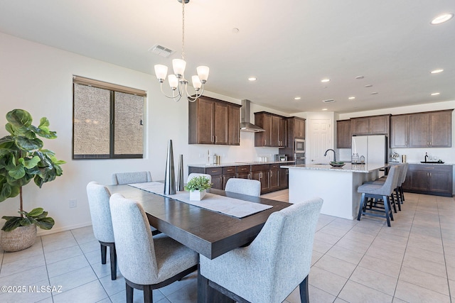 dining room with light tile patterned floors, recessed lighting, visible vents, baseboards, and an inviting chandelier