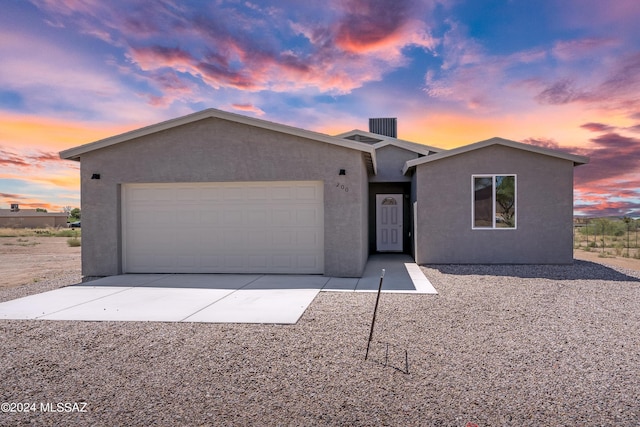 ranch-style home with a garage