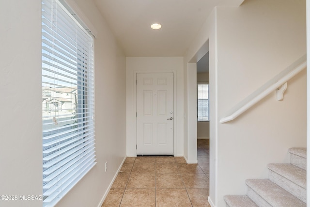 interior space featuring light tile patterned flooring