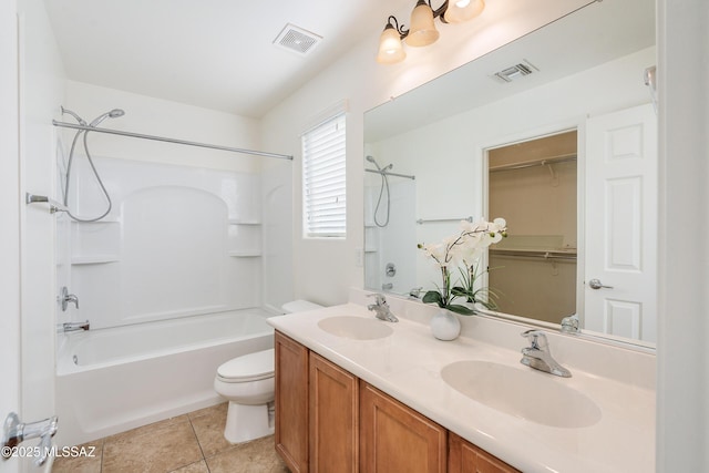 full bathroom featuring tile patterned floors, vanity, shower / bathtub combination, and toilet