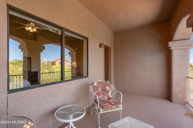 view of patio with ceiling fan