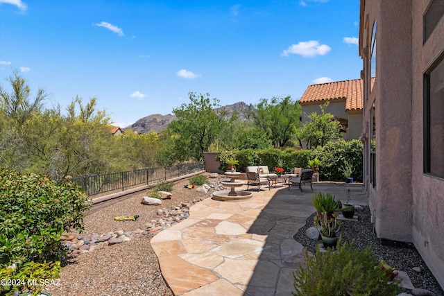 view of patio with a mountain view