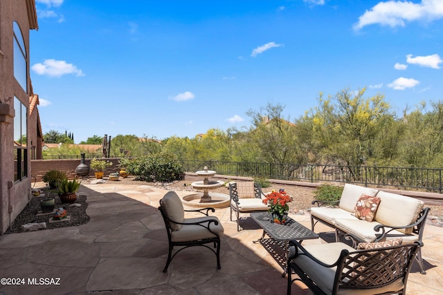 view of patio with an outdoor living space