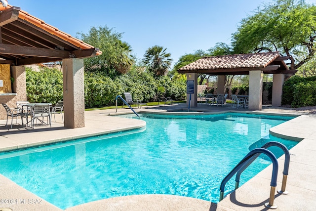 view of pool with a gazebo and a patio area