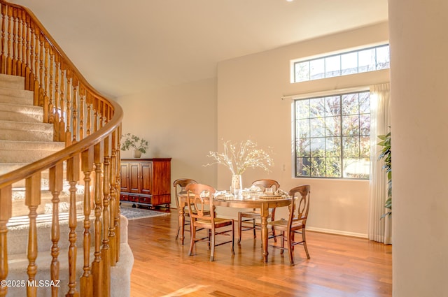 dining area with light hardwood / wood-style flooring