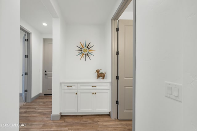 hall featuring light wood-type flooring