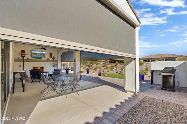 view of patio / terrace featuring ceiling fan and area for grilling