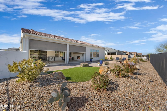 back of house featuring a patio