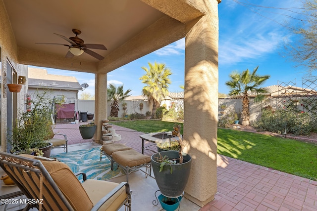 view of patio with ceiling fan