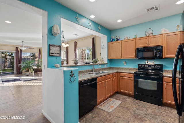 kitchen with ceiling fan, sink, pendant lighting, light tile patterned floors, and black appliances