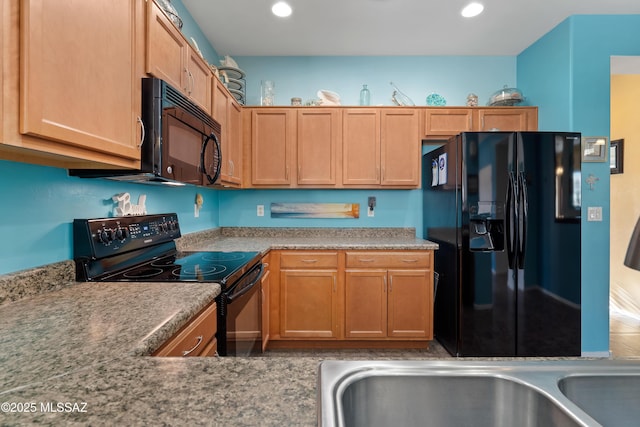 kitchen featuring black appliances