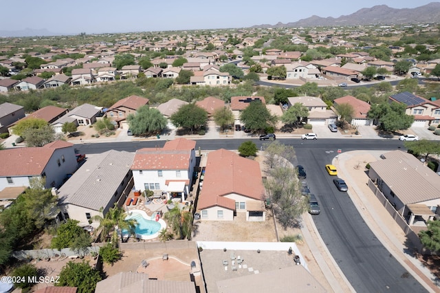 drone / aerial view featuring a mountain view and a residential view