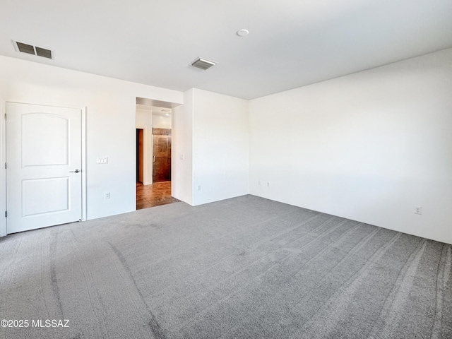 8015 S Galileo Ln, Tucson, AZ 85747 - empty room featuring carpet and visible vents