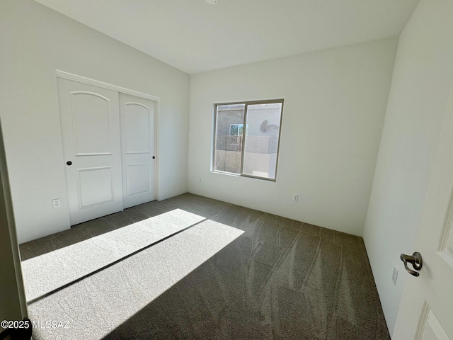 8015 S Galileo Ln, Tucson, AZ 85747 - unfurnished bedroom with carpet and a closet