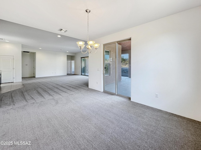 8015 S Galileo Ln, Tucson, AZ 85747 - carpeted empty room with visible vents, recessed lighting, and a notable chandelier