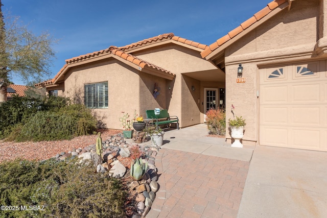 view of front of property with a garage