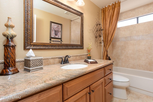 full bathroom with tile patterned floors, vanity, toilet, and shower / bath combo