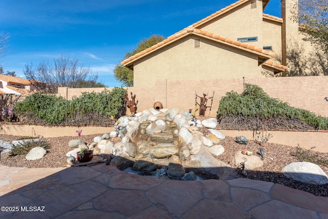 view of home's exterior featuring a patio area