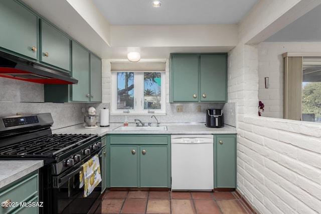 kitchen featuring tasteful backsplash, gas range, sink, green cabinetry, and dishwasher