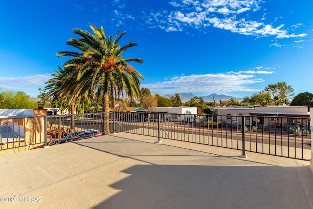 view of gate featuring a mountain view