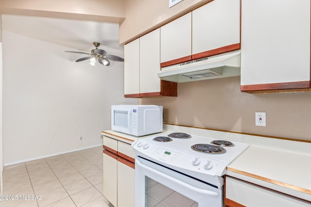 kitchen featuring white cabinetry, light tile patterned floors, ceiling fan, and white appliances